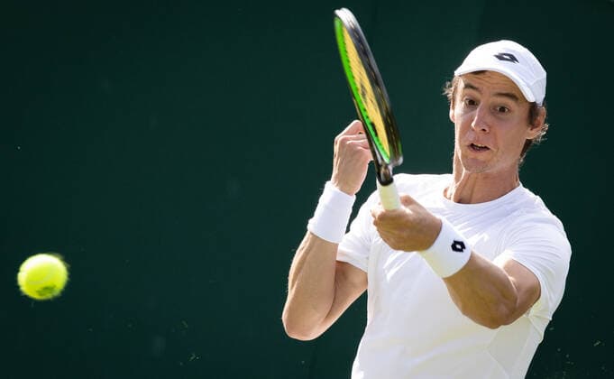 Belgian Joran Vliegen pictured in action during a second round game in the men s doubles tournament between Belgian Vliegen - US Withrow and Australian Ebden - Australian Purcell at the 2022 Wimbledon grand slam tennis tournament at the All England Tennis Club, in south-west London, Britain, Saturday 02 July 2022. BENOITxDOPPAGNE  x36952115x