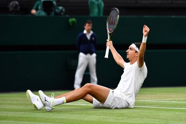 Mandatory Credit: Photo by James Veysey Shutterstock (13012407dt) Lorenzo Sonego slides to play a winner and ends up on his back during his third round match Wimbledon Tennis Championships, Day 6, The All England Lawn Tennis and Croquet Club, London, UK - 02 Jul 2022 Wimbledon Tennis Championships, Day 6, The All England Lawn Tennis and Croquet Club, London, UK - 02 Jul 2022  Copyright: xJamesxVeysey Shutterstockx 13012407dt