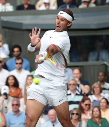Spain s Rafael Nadal in action in his third round match against Italian Lorenzo Sonego on day six of the 2022 Wimbledon championships in London on Saturday, July 02, 2022.  LON2022070282 HUGOxPHILPOTT