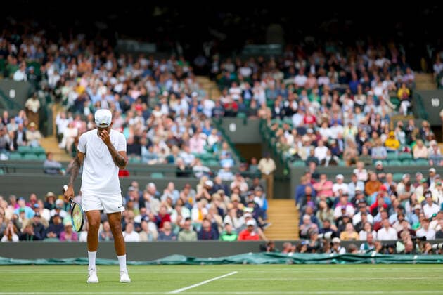 2nd July 2022, All England Lawn Tennis and Croquet Club, London, England; Wimbledon Tennis tournament; Nick Kyrgios covers his face due to a error with a drop shot during his match with Stefanos Tsitsipas in the mens singles  ActionPlus12404359 ShaunxBrooks