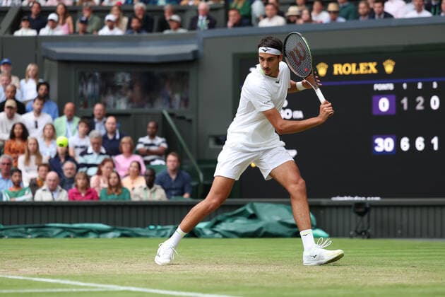 2nd July 2022, All England Lawn Tennis and Croquet Club, London, England; Wimbledon Tennis tournament; Lorenzo Sonego plays a backhand to Rafael Nadal in the mens singles  ActionPlus12404367 ShaunxBrooks