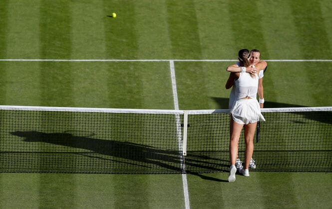 (220703) -- LONDON, July 3, 2022 -- Paula Badosa (L) hugs with Petra Kvitova after the women s singles third round match between Petra Kvitova of the Czech Republic and Paula Badosa of Spain at Wimbledon Tennis Championship in London, Britain, on July 2, 2022. ) (SP)BRITAIN-LONDON-TENNIS-WIMBLEDON-WOMEN S SINGLES HanxYan 