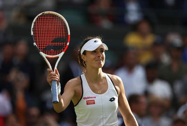(220703) -- LONDON, July 3, 2022 -- Alize Cornet celebrates after winning the women s singles third round match between Alize Cornet of France and Iga Swiatek of Poland at Wimbledon Tennis Championship in London, Britain, on July 2, 2022. ) (SP)BRITAIN-LONDON-TENNIS-WIMBLEDON-WOMEN S SINGLES HanxYan 