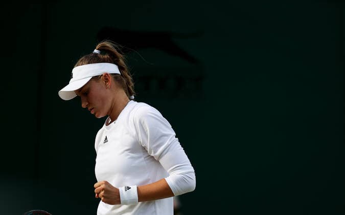 (220703) -- LONDON, July 3, 2022 -- Elena Rybakina reacts during the women s singles third round match between Zheng Qinwen of China and Elena Rybakina of Kazakhstan at Wimbledon Tennis Championship in London, Britain, on July 2, 2022. ) (SP)BRITAIN-LONDON-TENNIS-WIMBLEDON-WOMEN S SINGLES LixYing 