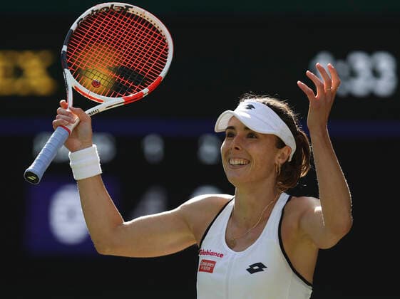 (220703) -- LONDON, July 3, 2022 -- Alize Cornet celebrates after winning the women s singles third round match between Alize Cornet of France and Iga Swiatek of Poland at Wimbledon Tennis Championship in London, Britain, on July 2, 2022. ) (SP)BRITAIN-LONDON-TENNIS-WIMBLEDON-WOMEN S SINGLES HanxYan 