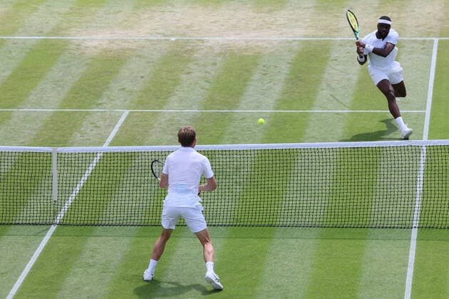 Belgian David Goffin and American Frances Tiafoe pictured in action during the fourth round of the men s singles tournament at the 2022 Wimbledon grand slam tennis tournament at the All England Tennis Club, in south-west London, Britain, Sunday 03 July 2022. BENOITxDOPPAGNE  x36969370x