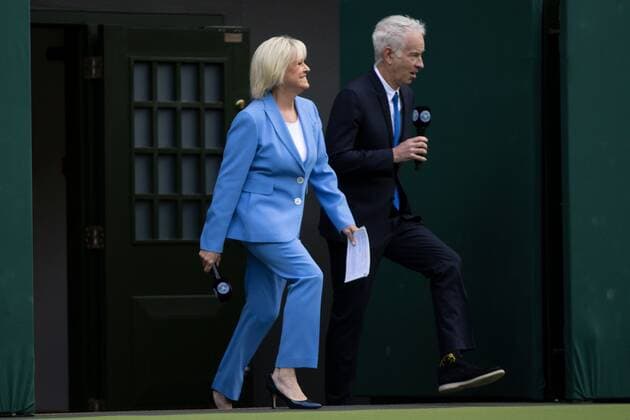 Mandatory Credit: Photo by Ella Ling Shutterstock (13012853d) Sue Barker and John McEnroe walk onto Centre Court to host the centenary celebrations Wimbledon Tennis Championships, Day 7, The All England Lawn Tennis and Croquet Club, London, UK - 03 Jul 2022 Wimbledon Tennis Championships, Day 7, The All England Lawn Tennis and Croquet Club, London, UK - 03 Jul 2022  Copyright: xEllaxLing Shutterstockx 13012853d