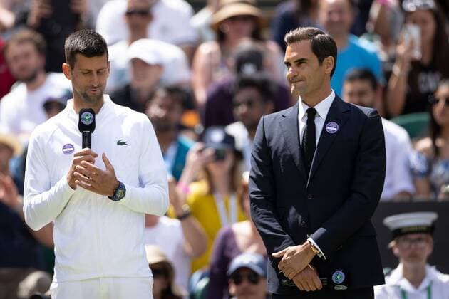 Mandatory Credit: Photo by Ella Ling Shutterstock (13012853y) Novak Djokovic and Roger Federer on Centre Court as part of the centenary celebrations Wimbledon Tennis Championships, Day 7, The All England Lawn Tennis and Croquet Club, London, UK - 03 Jul 2022 Wimbledon Tennis Championships, Day 7, The All England Lawn Tennis and Croquet Club, London, UK - 03 Jul 2022  Copyright: xEllaxLing Shutterstockx 13012853y