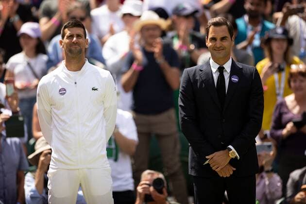 Mandatory Credit: Photo by Ella Ling Shutterstock (13012853r) Novak Djokovic and Roger Federer on Centre Court as part of the centenary celebrations Wimbledon Tennis Championships, Day 7, The All England Lawn Tennis and Croquet Club, London, UK - 03 Jul 2022 Wimbledon Tennis Championships, Day 7, The All England Lawn Tennis and Croquet Club, London, UK - 03 Jul 2022  Copyright: xEllaxLing Shutterstockx 13012853r