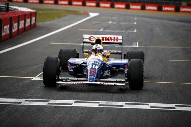VETTEL Sebastian (ger), Aston Martin F1 Team AMR22, portrait with the Nigel Mansel™car Williams-Renault FW14B during the Formula 1 Lenovo British Grand Prix 2022, 10th round of the 2022 FIA Formula One World Championship, WM, Weltmeisterschaft on the Silverstone Circuit, from July 1 to 3, 2022 in Silverstone, United Kingdom - F1 - BRITISH GRAND PRIX 2022 - RACE DPPI Panoramic  00122025__B3_8818
