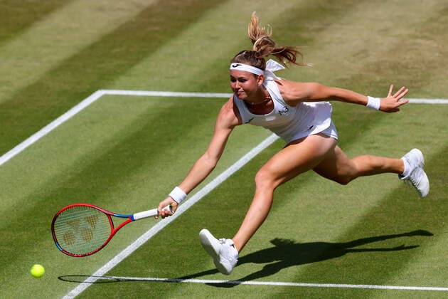 3rd July 2022, All England Lawn Tennis and Croquet Club, London, England; Wimbledon Tennis tournament; Marie Bouzkova plays a volley at the net against Caroline Garcia in the ladies singles  ActionPlus12404409 ShaunxBrooks