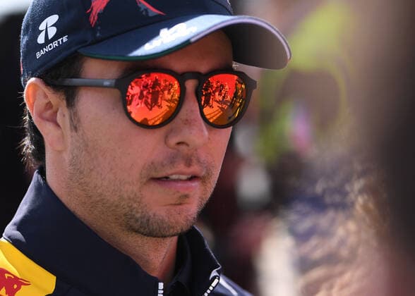 3rd July 2022, Silverstone Circuit, Silverstone, Northamptonshire, England: British F1 Grand Prix, Race day: Sergio Perez signs autographs on his arrival at the Paddock  ActionPlus12404461 SimonxWest