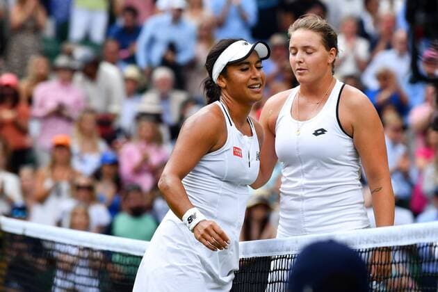 Mandatory Credit: Photo by James Veysey Shutterstock (13012856cz) Jule Niemeier celebrates victory in her fourth round match against Heather Watson Wimbledon Tennis Championships, Day 7, The All England Lawn Tennis and Croquet Club, London, UK - 03 Jul 2022 Wimbledon Tennis Championships, Day 7, The All England Lawn Tennis and Croquet Club, London, UK - 03 Jul 2022  Copyright: xJamesxVeysey Shutterstockx 13012856cz