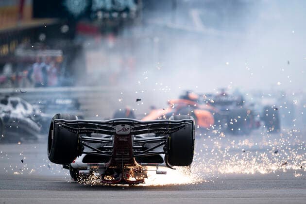 July 3, 2022, Towcester, Great Britain: GUANYU ZHOU of China and Alfa Romeo Racing crashes at the start of the 2022 FIA Formula 1 British Grand Prix at Silverstone Circuit in Towcester, Great Britain. Towcester Great Britain - ZUMAg147 20220703_zap_g147_006 Copyright: xJamesxGasperottix