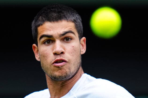 Mandatory Credit: Photo by James Veysey Shutterstock (13012857cs) Carlos Alcaraz during his fourth round match Wimbledon Tennis Championships, Day 7, The All England Lawn Tennis and Croquet Club, London, UK - 03 Jul 2022 Wimbledon Tennis Championships, Day 7, The All England Lawn Tennis and Croquet Club, London, UK - 03 Jul 2022  Copyright: xJamesxVeysey Shutterstockx 13012857cs