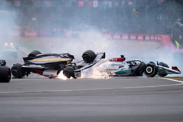 July 3, 2022, Towcester, Great Britain: GUANYU ZHOU of China and Alfa Romeo Racing crashes at the start of the 2022 FIA Formula 1 British Grand Prix at Silverstone Circuit in Towcester, Great Britain. Towcester Great Britain - ZUMAg147 20220703_zap_g147_013 Copyright: xJamesxGasperottix