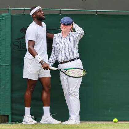 American Frances Tiafoe and a line judge pictured during a tennis match between Belgian Goffin and US Tiafoe in the fourth round of the men s singles tournament at the 2022 Wimbledon grand slam tennis tournament at the All England Tennis Club, in south-west London, Britain, Sunday 03 July 2022. BENOITxDOPPAGNE  x36974854x