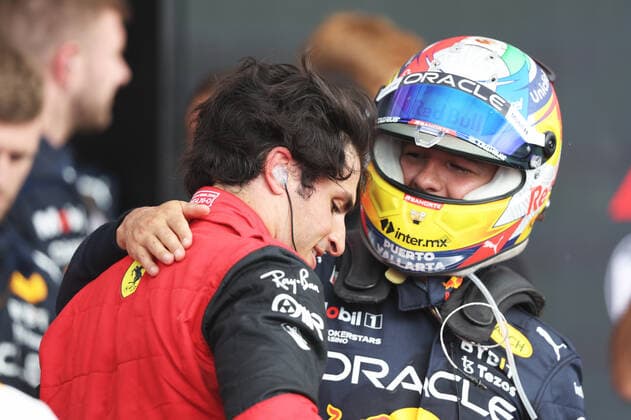 SAINZ Carlos (spa), Scuderia Ferrari F1-75, portrait celebrates his victory with PEREZ Sergio (mex), Red Bull Racing RB18, portrait during the Formula 1 Lenovo British Grand Prix 2022, 10th round of the 2022 FIA Formula One World Championship, WM, Weltmeisterschaft on the Silverstone Circuit, from July 1 to 3, 2022 in Silverstone, United Kingdom - F1 - BRITISH GRAND PRIX 2022 - RACE DPPI Panoramic  GOOD1282