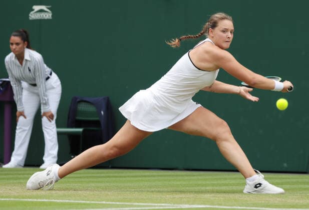 Jule Niemeier (GER) returns a shot to Heather Watson (GBR) during the Womens Singles Fourth Round Match on Centre Court on Day 7 of The Championships Wimbledon 2022 at All England Lawn Tennis and Croquet Club on July 3, 2022 in London, England.  Copyright: xx