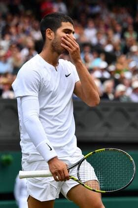 Mandatory Credit: Photo by James Veysey Shutterstock (13012856fb) Carlos Alcaraz during his fourth round match Wimbledon Tennis Championships, Day 7, The All England Lawn Tennis and Croquet Club, London, UK - 03 Jul 2022 Wimbledon Tennis Championships, Day 7, The All England Lawn Tennis and Croquet Club, London, UK - 03 Jul 2022  Copyright: xJamesxVeysey Shutterstockx 13012856fb