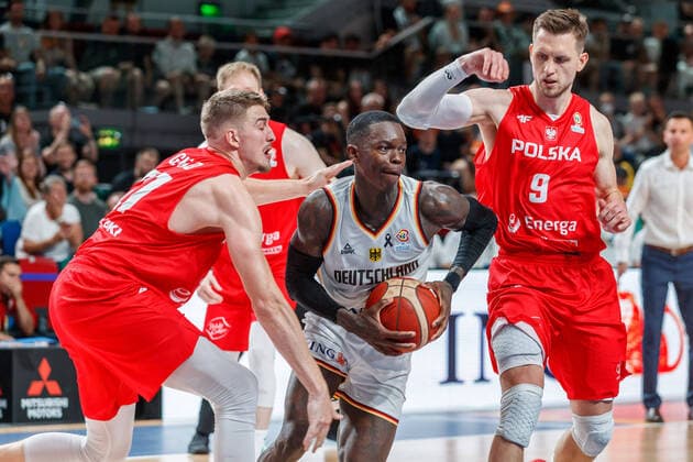 from left Tomasz Gielo POL, 21 , Dennis Schroeder GER, 17 , Mateusz Ponitka POL, 9 , 7 3 2022, Bremen Germany , Basketball, Men, European Qualifiers, Germany Poland xprx