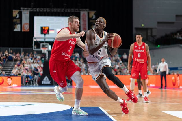 Basketball Bremen 03 07 2022 FIBA Basketball Worldcup European Qualifiers Triathlon Germany GER Poland POL Isaac Bonga Germany, No 00 Michal Sokolowski Poland, No 03