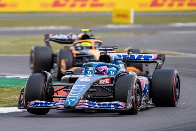 3rd July 2022, Silverstone Circuit, Silverstone, Northamptonshire, England: British F1 Grand Prix, Race day: BWT Alpine F1 Team driver Fernando Alonso in his Alpine-Renault A522 leads from McLaren F1 Team driver Lando Norris in his McLaren-Mercedes MCL36  ActionPlus12404970 TimxWilliams
