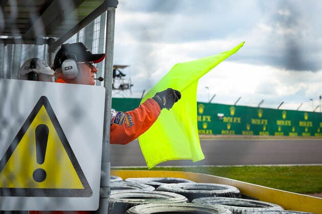 Marshal waves yellow flag, F1 Grand Prix of Great Britain at Silverstone Circuit on July 3, 2022 in Silverstone, United Kingdom Photo by HOCH ZWEI Silverstone United Kingdom