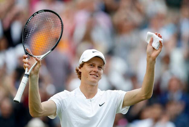 (220704) -- LONDON, July 4, 2022 -- Jannik Sinner of Italy reacts after winning the men s singles fourth round match against Carlos Alcaraz of Spain at Wimbledon tennis Championship in London, Britain, on July 3, 2022. ) (SP)BRITAIN-LONDON-TENNIS-WIMBLEDON-MEN S SINGLES HanxYan 