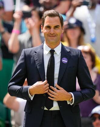 Mandatory Credit: Photo by Dave Shopland Shutterstock (13012855cj) Roger Federer on Centre Court as part of the centenary celebrations Wimbledon Tennis Championships, Day 7, The All England Lawn Tennis and Croquet Club, London, UK - 03 Jul 2022 Wimbledon Tennis Championships, Day 7, The All England Lawn Tennis and Croquet Club, London, UK - 03 Jul 2022  Copyright: xDavexShopland Shutterstockx 13012855cj