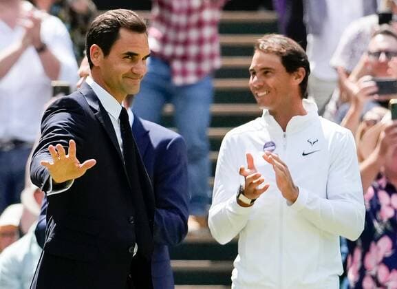 Mandatory Credit: Photo by Dave Shopland Shutterstock (13012855cf) Roger Federer and Rafael Nadal on Centre Court as part of the centenary celebrations Wimbledon Tennis Championships, Day 7, The All England Lawn Tennis and Croquet Club, London, UK - 03 Jul 2022 Wimbledon Tennis Championships, Day 7, The All England Lawn Tennis and Croquet Club, London, UK - 03 Jul 2022  Copyright: xDavexShopland Shutterstockx 13012855cf