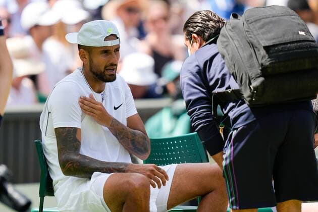 Mandatory Credit: Photo by Dave Shopland Shutterstock (13012860l) Nick Kyrgios is seen by the physic after he injures his arm during his fourth round match Wimbledon Tennis Championships, Day 8, The All England Lawn Tennis and Croquet Club, London, UK - 04 Jul 2022 Wimbledon Tennis Championships, Day 8, The All England Lawn Tennis and Croquet Club, London, UK - 04 Jul 2022  Copyright: xDavexShopland Shutterstockx 13012860l