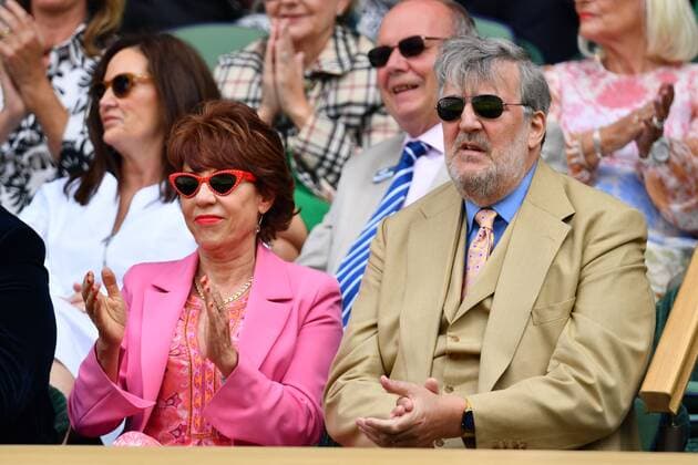 Mandatory Credit: Photo by James Veysey Shutterstock (13012861bw) Kathy Lette and Stephen Fry in the Royal Box on Centre Court Wimbledon Tennis Championships, Day 8, The All England Lawn Tennis and Croquet Club, London, UK - 04 Jul 2022 Wimbledon Tennis Championships, Day 8, The All England Lawn Tennis and Croquet Club, London, UK - 04 Jul 2022  Copyright: xJamesxVeysey Shutterstockx 13012861bw