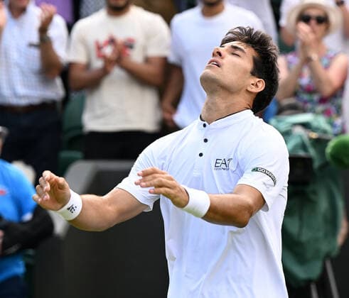 Tennis Championships - Week One - Day Eight - All England Lawn Tennis Club, Wimbledon - Monday 4th July 2022 Cristian Garin (CHI) v Alex de Minaur (AUS) Cristian Garin celebrates winning match point 