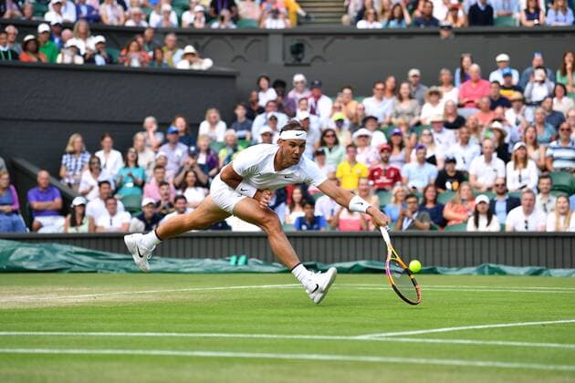 Mandatory Credit: Photo by James Veysey Shutterstock (13012861fm) Rafael Nadal during his fourth round match Wimbledon Tennis Championships, Day 8, The All England Lawn Tennis and Croquet Club, London, UK - 04 Jul 2022 Wimbledon Tennis Championships, Day 8, The All England Lawn Tennis and Croquet Club, London, UK - 04 Jul 2022  Copyright: xJamesxVeysey Shutterstockx 13012861fm