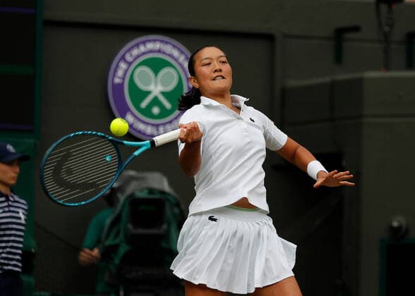 4th July 2022, All England Lawn Tennis and Croquet Club, London, England; Wimbledon Tennis tournament; Harmony Tan (FRA) plays a forehand to Amanda Anisimova (USA)  ActionPlus12405159 JohnxPatrickxFletcher