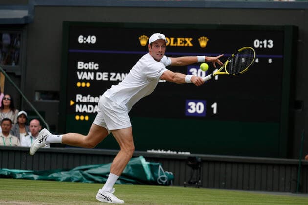 4th July 2022, All England Lawn Tennis and Croquet Club, London, England; Wimbledon Tennis tournament; Botic Van De Zandschulp (NED) plays a backhand to Rafael Nadal (ESP)  ActionPlus12405194 JohnxPatrickxFletcher