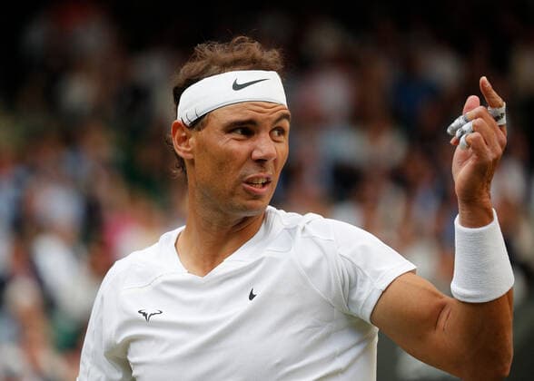 4th July 2022, All England Lawn Tennis and Croquet Club, London, England; Wimbledon Tennis tournament; Rafael Nadal (ESP) questioning the Umpire about a call  ActionPlus12405196 JohnxPatrickxFletcher