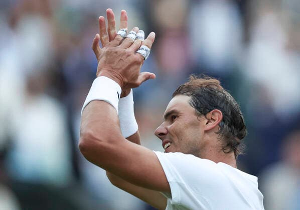 (220705) -- LONDON, July 5, 2022 -- Rafael Nadal celebrates after winning the men s singles fourth round match between Rafael Nadal of Spain and Botic van de Zandschulp of the Netherlands at Wimbledon Tennis Championship in London, Britain, on July 4, 2022. ) (SP)BRITAIN-LONDON-TENNIS-WIMBLEDON-MEN S SINGLES HanxYan 