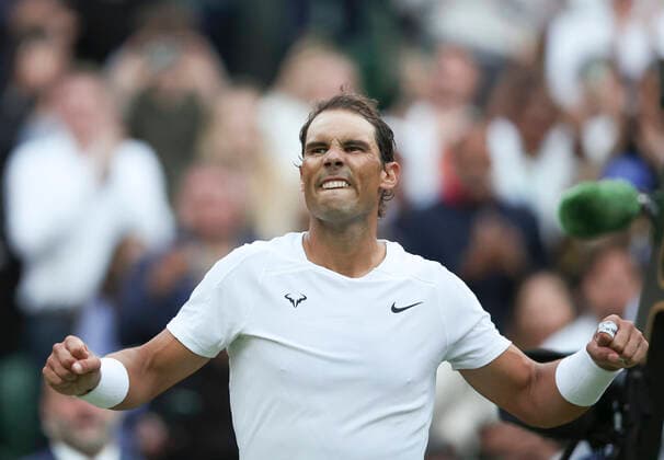 (220705) -- LONDON, July 5, 2022 -- Rafael Nadal celebrates after winning the men s singles fourth round match between Rafael Nadal of Spain and Botic van de Zandschulp of the Netherlands at Wimbledon Tennis Championship in London, Britain, on July 4, 2022. ) (SP)BRITAIN-LONDON-TENNIS-WIMBLEDON-MEN S SINGLES HanxYan 