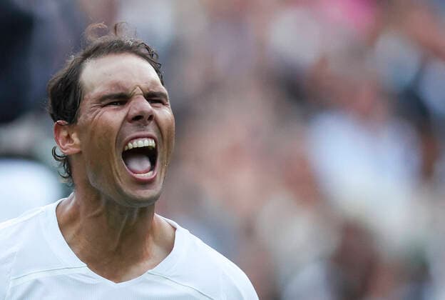 (220705) -- LONDON, July 5, 2022 -- Rafael Nadal celebrates after winning the men s singles fourth round match between Rafael Nadal of Spain and Botic van de Zandschulp of the Netherlands at Wimbledon Tennis Championship in London, Britain, on July 4, 2022. ) (SP)BRITAIN-LONDON-TENNIS-WIMBLEDON-MEN S SINGLES HanxYan 