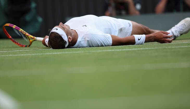 (220705) -- LONDON, July 5, 2022 -- Rafael Nadal reacts during the men s singles fourth round match between Rafael Nadal of Spain and Botic van de Zandschulp of the Netherlands at Wimbledon Tennis Championship in London, Britain, on July 4, 2022. ) (SP)BRITAIN-LONDON-TENNIS-WIMBLEDON-MEN S SINGLES HanxYan 