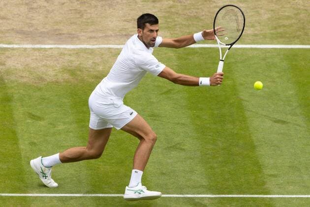 Mandatory Credit: Photo by Ella Ling Shutterstock (13012864x) Novak Djokovic during his quarter final match Wimbledon Tennis Championships, Day 9, The All England Lawn Tennis and Croquet Club, London, UK - 05 Jul 2022 Wimbledon Tennis Championships, Day 9, The All England Lawn Tennis and Croquet Club, London, UK - 05 Jul 2022  Copyright: xEllaxLing Shutterstockx 13012864x