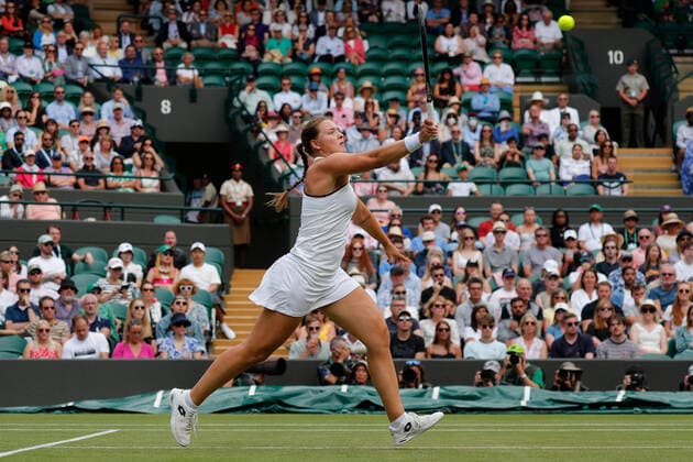 5th July 2022, All England Lawn Tennis and Croquet Club, London, England; Wimbledon Tennis tournament; Jule Niemeier (GER) plays a forehand to Tatjana Maria (GER)  ActionPlus12405225 JohnxPatrickxFletcher