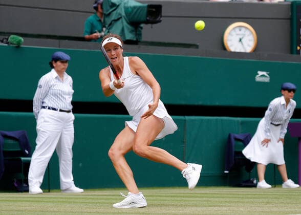 5th July 2022, All England Lawn Tennis and Croquet Club, London, England; Wimbledon Tennis tournament; Tatjana Maria (GER) plays a forehand to Jule Niemeier (GER)  ActionPlus12405230 JohnxPatrickxFletcher