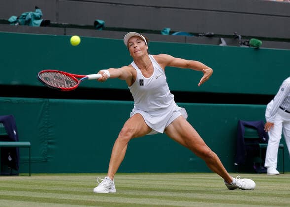 5th July 2022, All England Lawn Tennis and Croquet Club, London, England; Wimbledon Tennis tournament; Tatjana Maria (GER) plays a forehand to Jule Niemeier (GER)  ActionPlus12405233 JohnxPatrickxFletcher