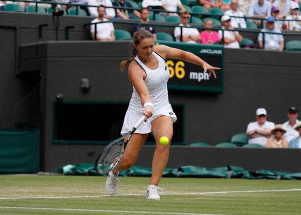 5th July 2022, All England Lawn Tennis and Croquet Club, London, England; Wimbledon Tennis tournament; Jule Niemeier (GER) plays a forehand to Tatjana Maria (GER)  ActionPlus12405235 JohnxPatrickxFletcher