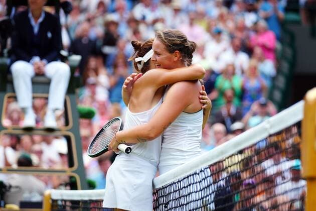 Mandatory Credit: Photo by Javier Garcia Shutterstock (13012869bm) Tatjana Maria and Jule Niemeier embrace after their quarter-final match in which Tatjana Maria won Wimbledon Tennis Championships, Day 9, The All England Lawn Tennis and Croquet Club, London, UK - 05 Jul 2022 Wimbledon Tennis Championships, Day 9, The All England Lawn Tennis and Croquet Club, London, UK - 05 Jul 2022  Copyright: xJavierxGarcia Shutterstockx 13012869bm