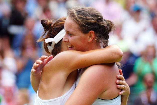 Mandatory Credit: Photo by Javier Garcia Shutterstock (13012869bl) Tatjana Maria and Jule Niemeier embrace after their quarter-final match in which Tatjana Maria won Wimbledon Tennis Championships, Day 9, The All England Lawn Tennis and Croquet Club, London, UK - 05 Jul 2022 Wimbledon Tennis Championships, Day 9, The All England Lawn Tennis and Croquet Club, London, UK - 05 Jul 2022  Copyright: xJavierxGarcia Shutterstockx 13012869bl