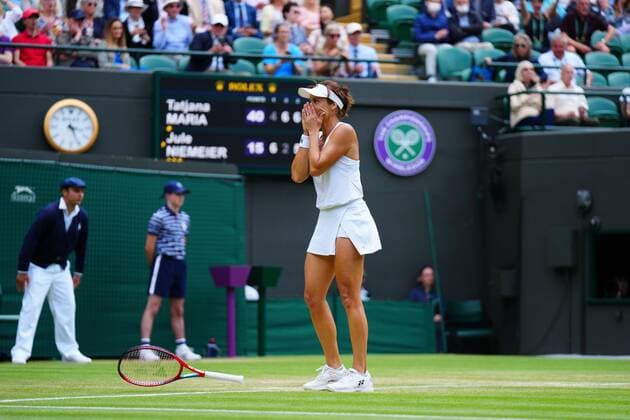 Mandatory Credit: Photo by Javier Garcia Shutterstock (13012869bs) Tatjana Maria celebrates victory in her quarter-final match Wimbledon Tennis Championships, Day 9, The All England Lawn Tennis and Croquet Club, London, UK - 05 Jul 2022 Wimbledon Tennis Championships, Day 9, The All England Lawn Tennis and Croquet Club, London, UK - 05 Jul 2022  Copyright: xJavierxGarcia Shutterstockx 13012869bs